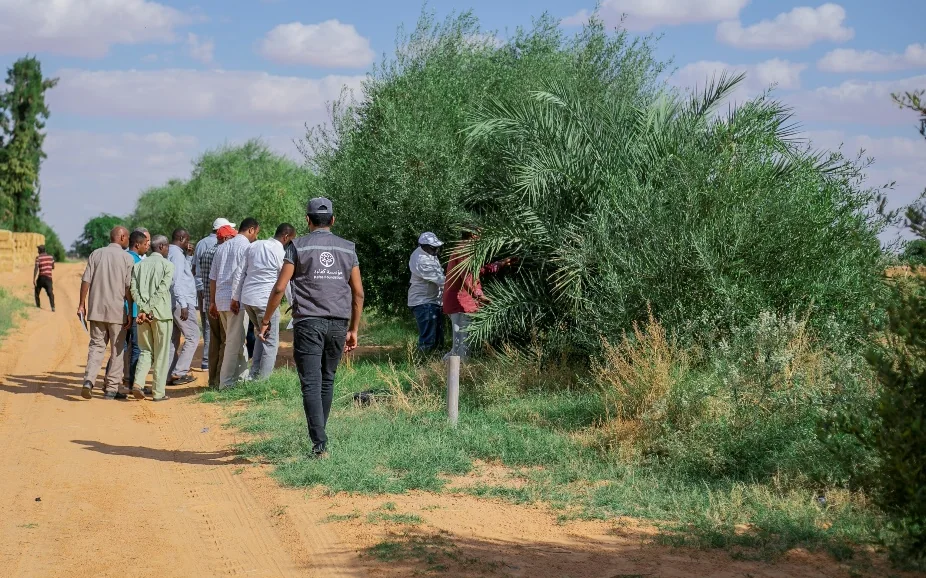 Agricultural field visit representing local farmer support